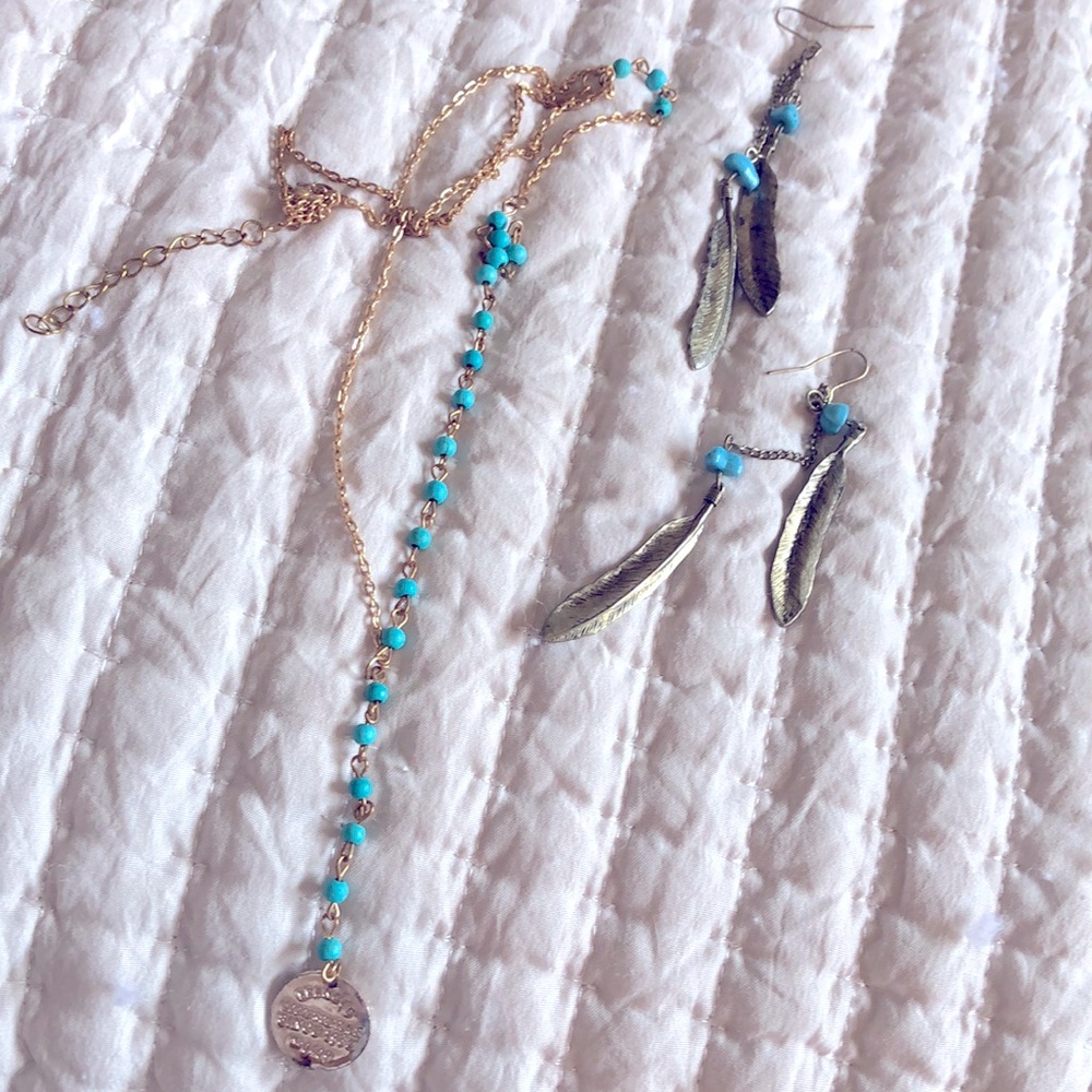 Long necklace and a pair of feather boho earrings